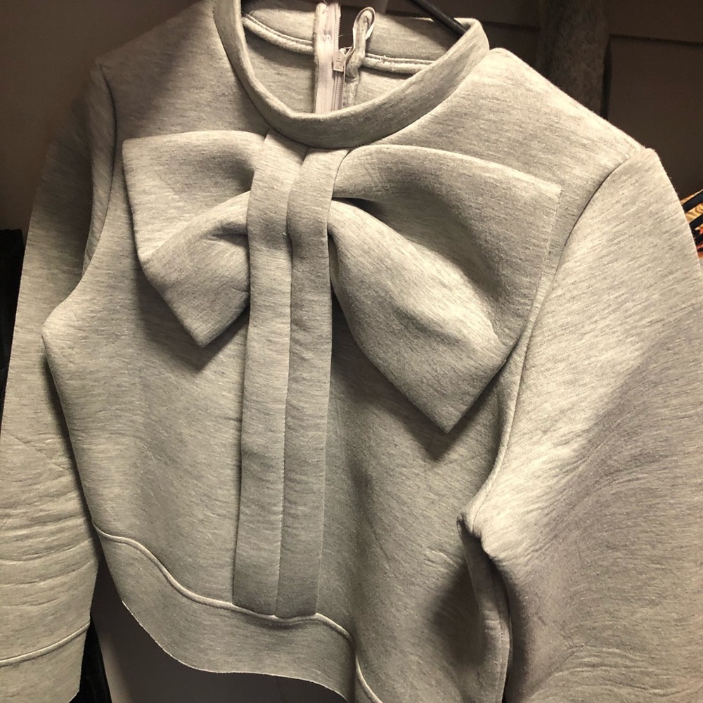 Sweater with a bow